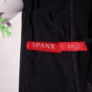 SPANX Faux Leather Leggings. Womens size Extra Small. Black in color.
